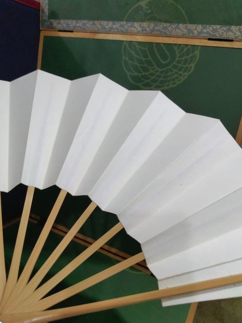 Japanese folding fan (Category: Other Accessories) located in Cebu City. Submitted by dudes_villanueva (Listing ID 1426394562, Image 2). Description: Japanese folding fan Design: White fan with black calligraphy In good condition.
