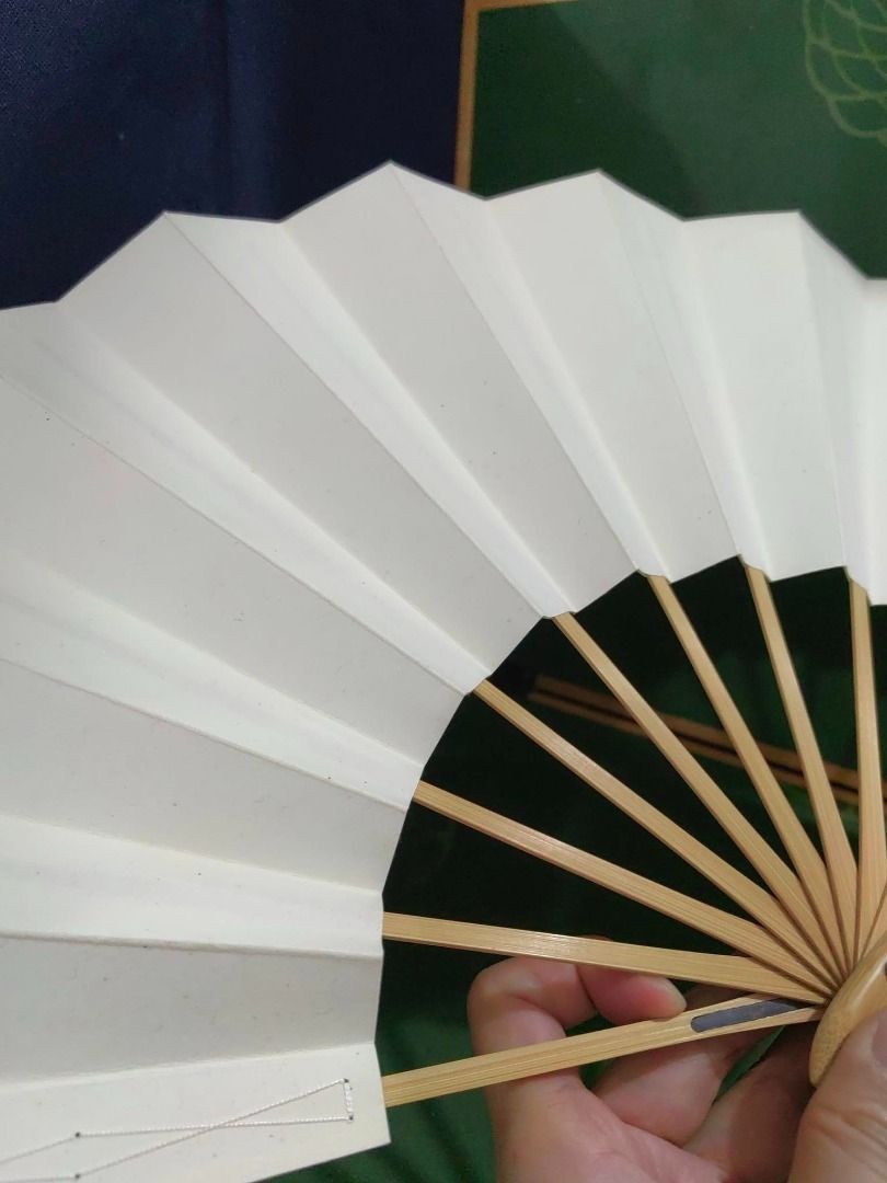 Japanese folding fan (Category: Other Accessories) located in Cebu City. Submitted by dudes_villanueva (Listing ID 1426394562, Image 3). Description: Japanese folding fan Design: White fan with black calligraphy In good condition.
