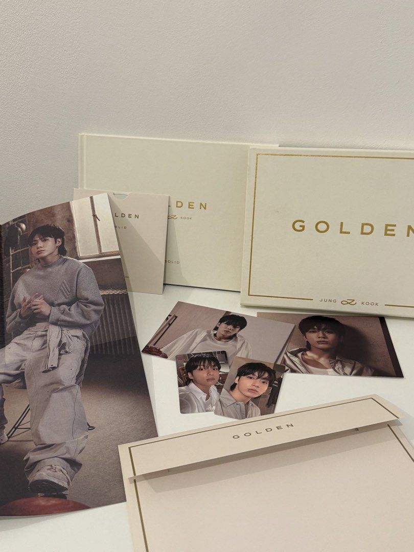 Jung Kook Golden Album (Category: CDs & DVDs) located in Las Pinas. Submitted by airahcamille97 (Listing ID 1426479747, Image 2). Description: Golden album by Jung Kook Solid Version. It includes the album box, photo cards, and a folio..