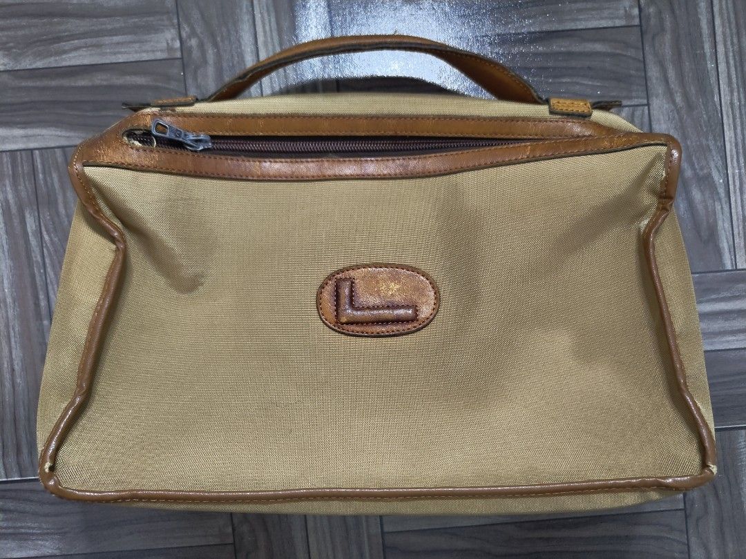 Lancel Paris Handbag (Category: Luxury Bags & Wallets) located in Quezon City. Submitted by thriftstershop (Listing ID 1426524822, Image 1). Description: Brand: Lancel Condition: Good Meet up: Trinoma or Cubao Shipping: LBC - Weekdays J&T - Weekends.