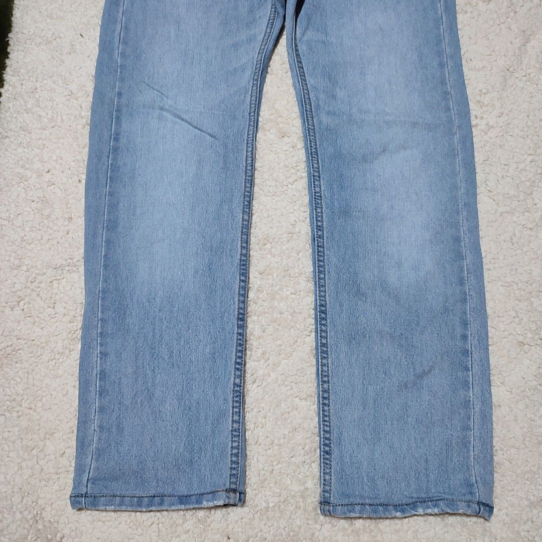 Levi's 505 Regular Fit Jeans W29 L32 (Category: Jeans) located in Manila. Submitted by anthonig (Listing ID 1426434278, Image 3). Description: Light blue Levi's 505 regular fit jeans. Features a button fly and classic five-pocket design. The jeans have a W29 L32 size. The Levi's red tab is visible on the back pocket. Price: 680 pesos Condition: 9/10 Issues: none PM if interested or for inquiries Meetups within MANILA only Can do shipping at buyer