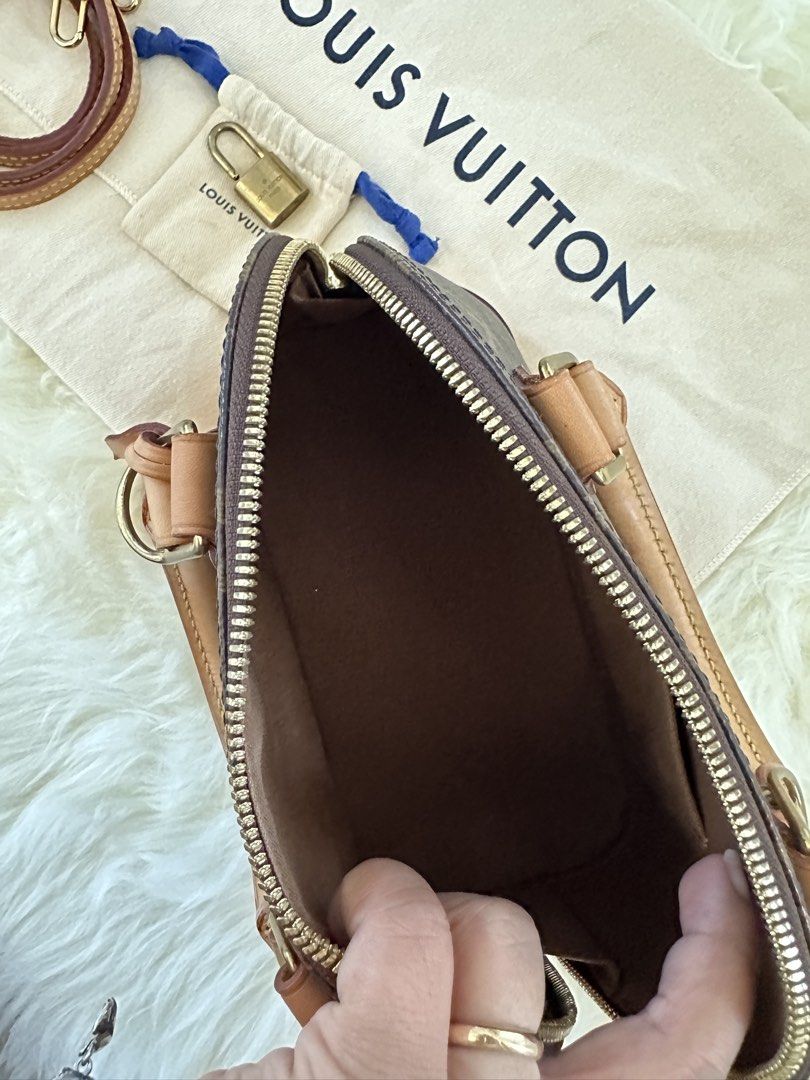 Louis Vuitton Alma BB Monogram Handbag (Category: Luxury Bags & Wallets) located in Caloocan City. Submitted by xmviiixxiii24 (Listing ID 1426554073, Image 3). Description: - Authentic Louis Vuitton Alma BB handbag - Monogram canvas - Detachable shoulder strap included - Comes with padlock and keys - Includes dust bag - Spacious interior with pocket - Classic dome shape - Rolled leather handles - Gold-tone hardware - Ideal for everyday or special