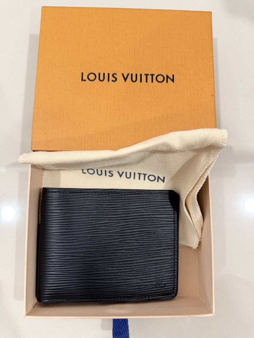 Louis Vuitton Epi Leather Wallet (Category: Bags & Wallets) located in Singapore. Submitted by evone87 (Listing ID 1426394098, Image 1). Description: Brand new buy from oversea No receipts Model M60662.