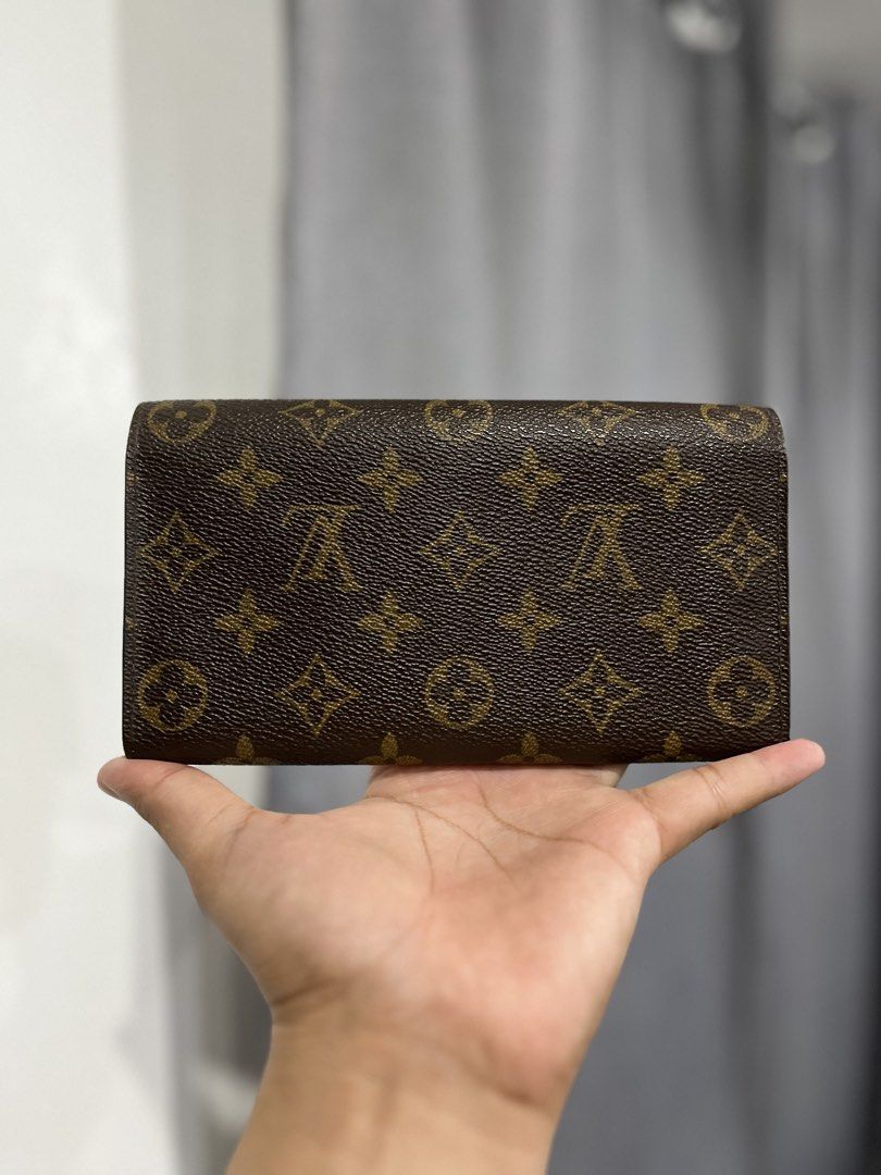Louis Vuitton Monogram Wallet (Category: Luxury Bags & Wallets) located in Manila. Submitted by luxwalletbags (Listing ID 1426533630, Image 2). Description: Authentic Louis Vuitton wallet in the classic Monogram pattern. Features a snap closure and multiple card slots. The wallet showcases the iconic LV monogram print. A stylish and functional accessory for everyday use. Made with durable materials, this wallet is designed to last..