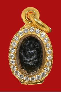 LP Tim BE 2505 Tiger Amulet — photo from a sourced market listing