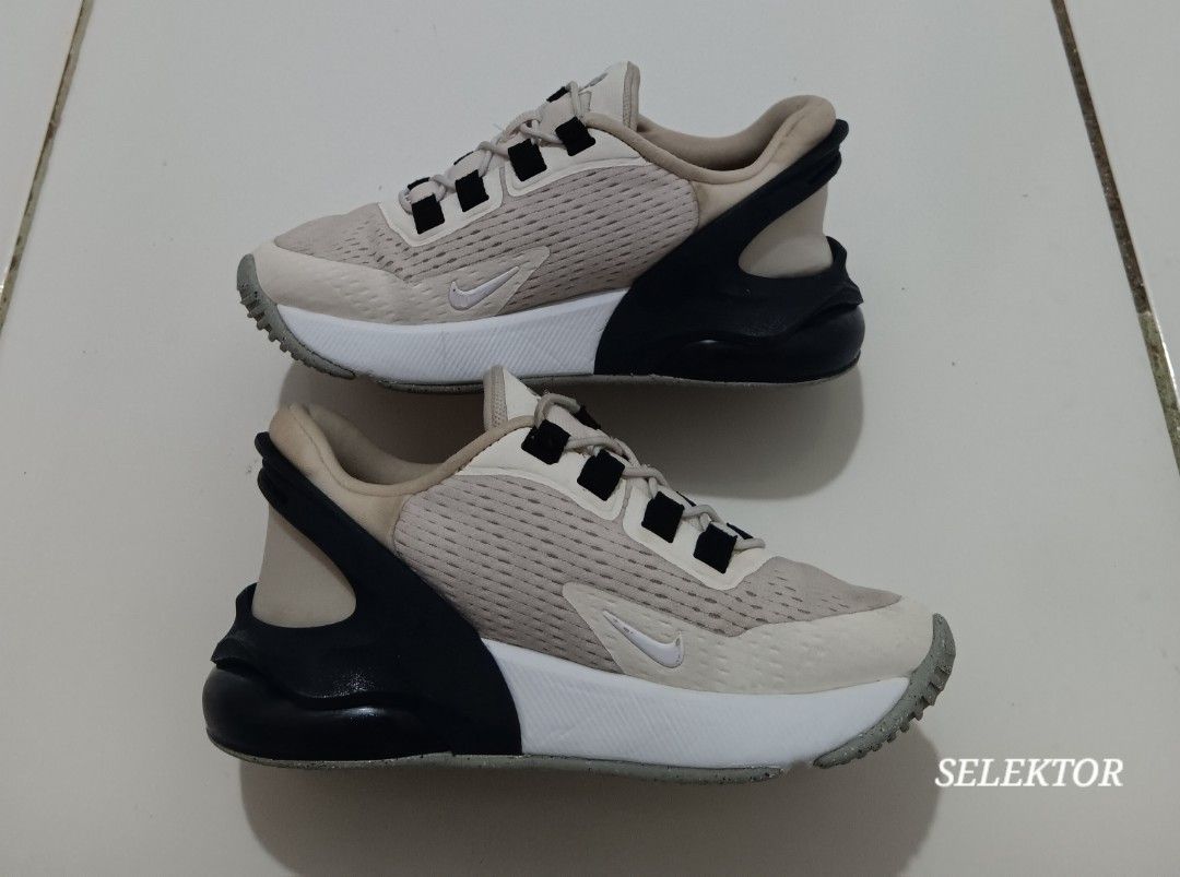 Nike Air Max 270 - Size 10.5C (Category: Babies & Kids Fashion) located in Dauis. Submitted by udenglegaspi (Listing ID 1426504016, Image 2). Description: Nike Air Max 270 sneakers in a beige and black colorway. Features a white midsole and a grey outsole. Size is 10.5C (16.5 cm). The shoes have a mesh upper with the Nike swoosh logo on the side. The shoes have black laces and a black heel counter..