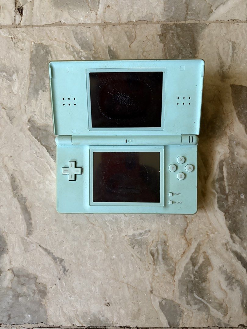 Nintendo DS Lite - Mint Green (Category: Nintendo) located in Marikina City. Submitted by dboyy (Listing ID 1426469583, Image 2). Description: Nintendo DS Lite It is still working but the screen has discoloration. Inclusions: Case Charger.