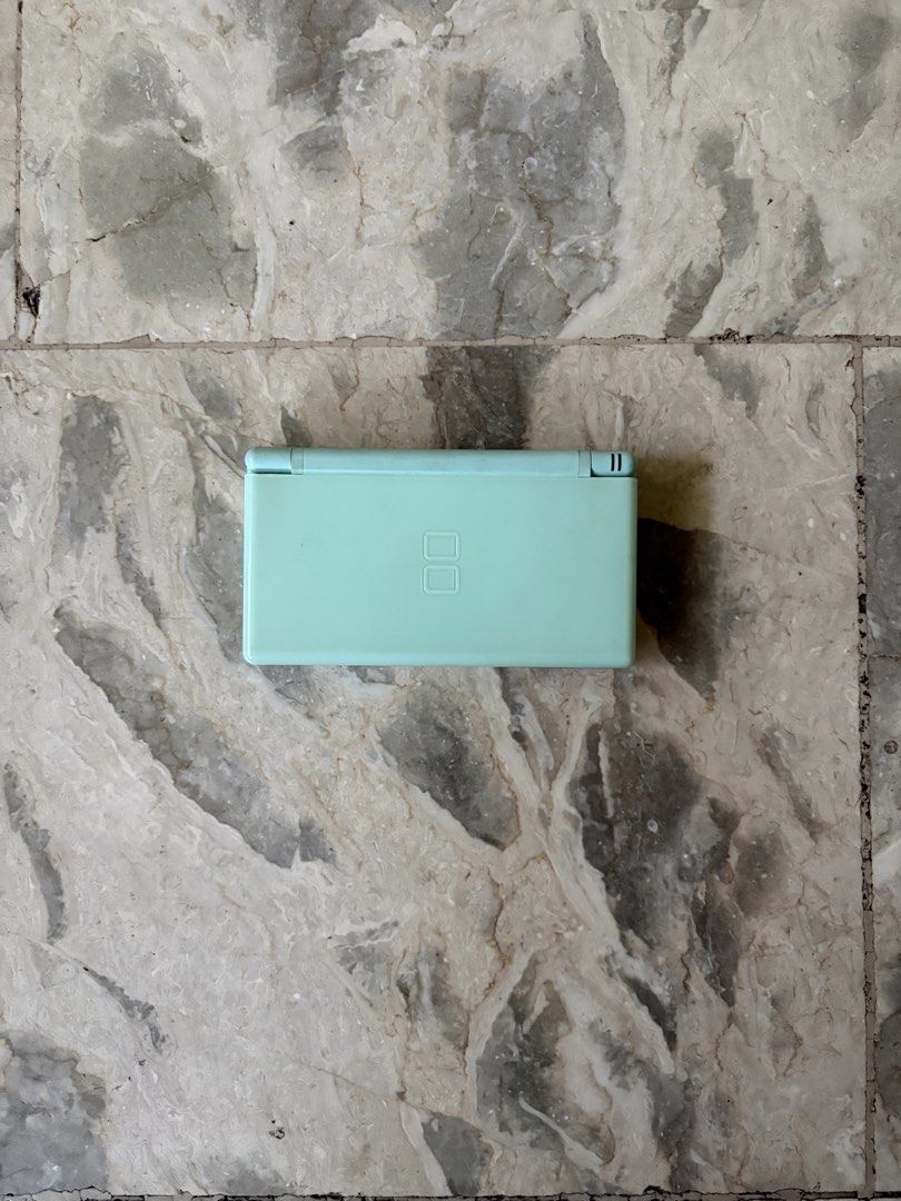 Nintendo DS Lite - Mint Green (Category: Nintendo) located in Marikina City. Submitted by dboyy (Listing ID 1426469583, Image 1). Description: Nintendo DS Lite It is still working but the screen has discoloration. Inclusions: Case Charger.