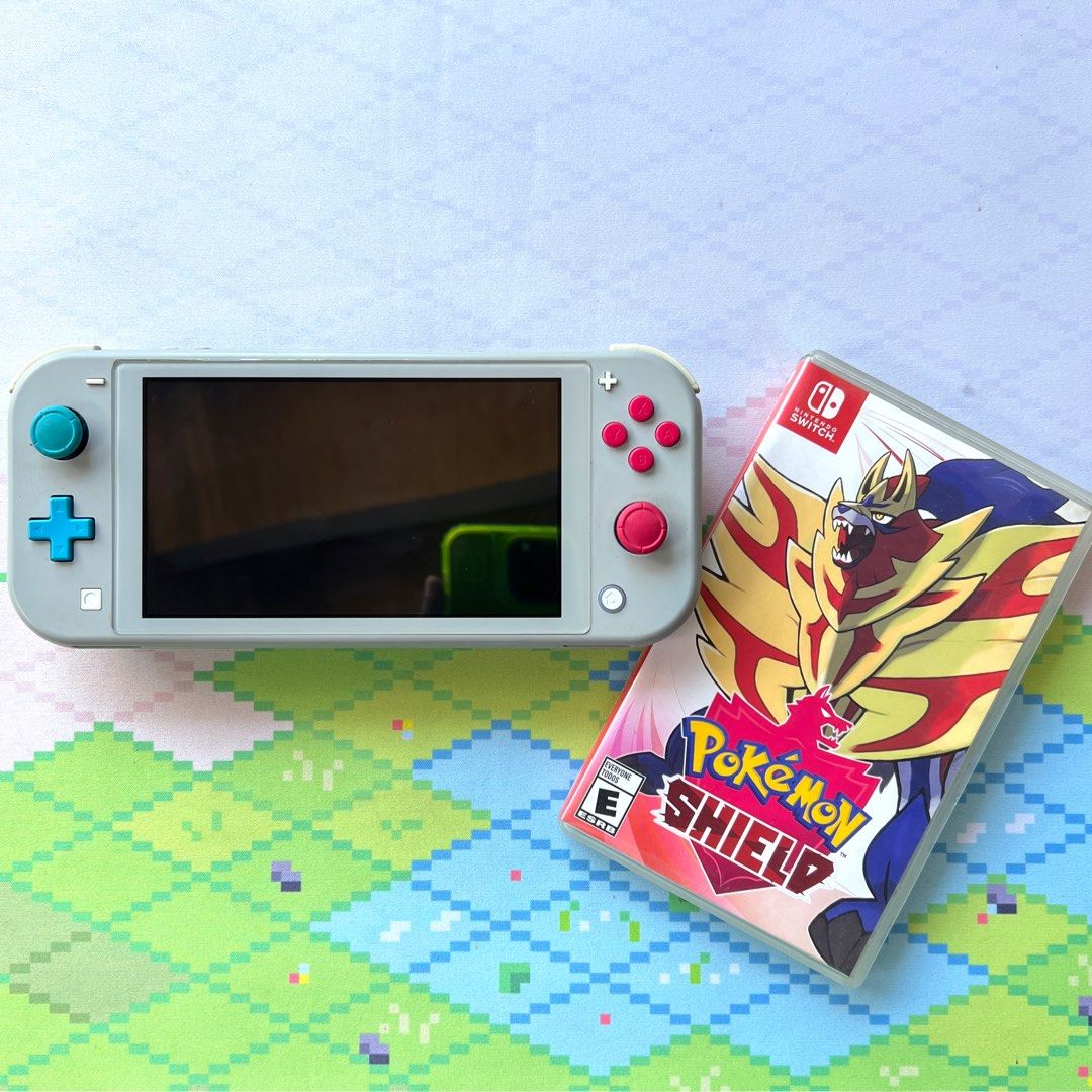 Nintendo Switch Lite Limited Edition w/ Pokemon Shield (Category: Nintendo) located in Manila. Submitted by gamejaystore (Listing ID 1426484727, Image 1). Description: For sale Switch Lite with Pokemon Shield Unit is in good condition, working all buttons and triggers, responsive touchscreen, all slots are working. Also comes with Pokemon Shield. No SD Card. Inclusion: - Switch Lite - Charger - Pokemon Shield Meetups at Ayala Malls Circuit or Sho