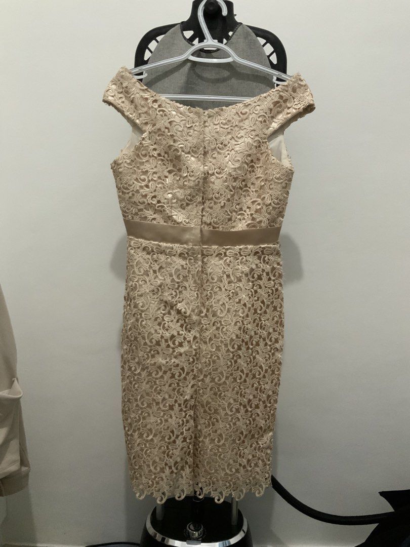 Off-Shoulder Padded Lace Beige Dress (Category: Dresses) located in Taguig. Submitted by mstyphoon (Listing ID 1426463987, Image 2). Description: Elegant off-shoulder dress in a beautiful beige lace. Features a satin ribbon detail at the waist. The dress has a fitted silhouette and falls to the knee. Perfect for special occasions like graduations. Needs wash only. Below knee-length for 5’1” height. .