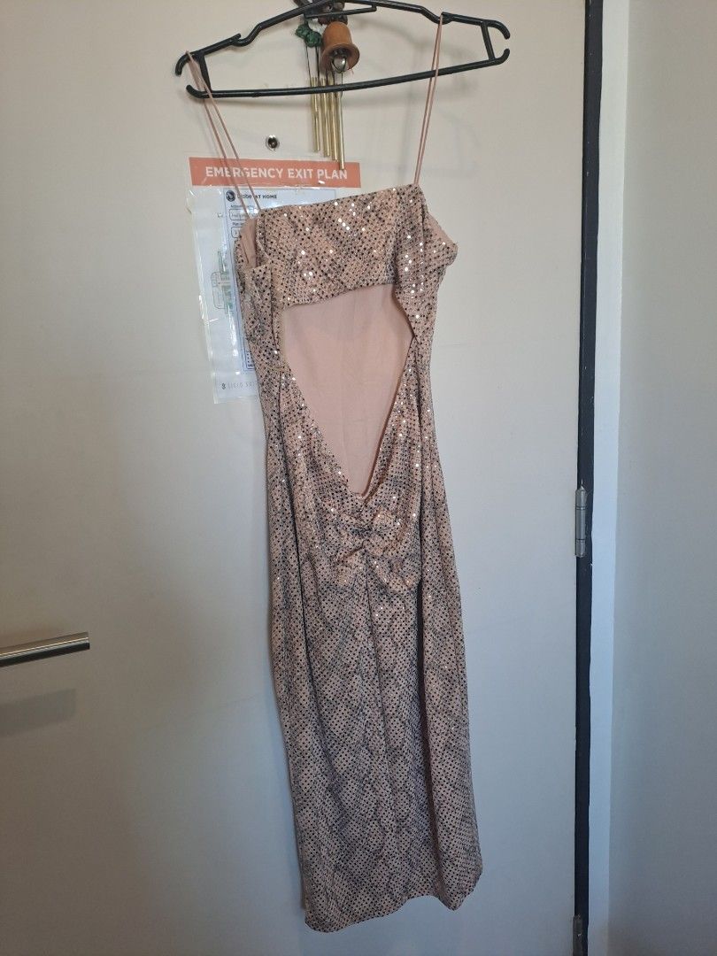 Olive Tree Sequin Dress (Category: Dresses) located in Manila. Submitted by joanbalde39643 (Listing ID 1426465181, Image 2). Description: Elegant dress from Olive Tree. Features a sequined design with a unique cut-out back. The dress has a flattering silhouette and is perfect for special occasions. It is a beautiful piece that adds a touch of glamour to any wardrobe..