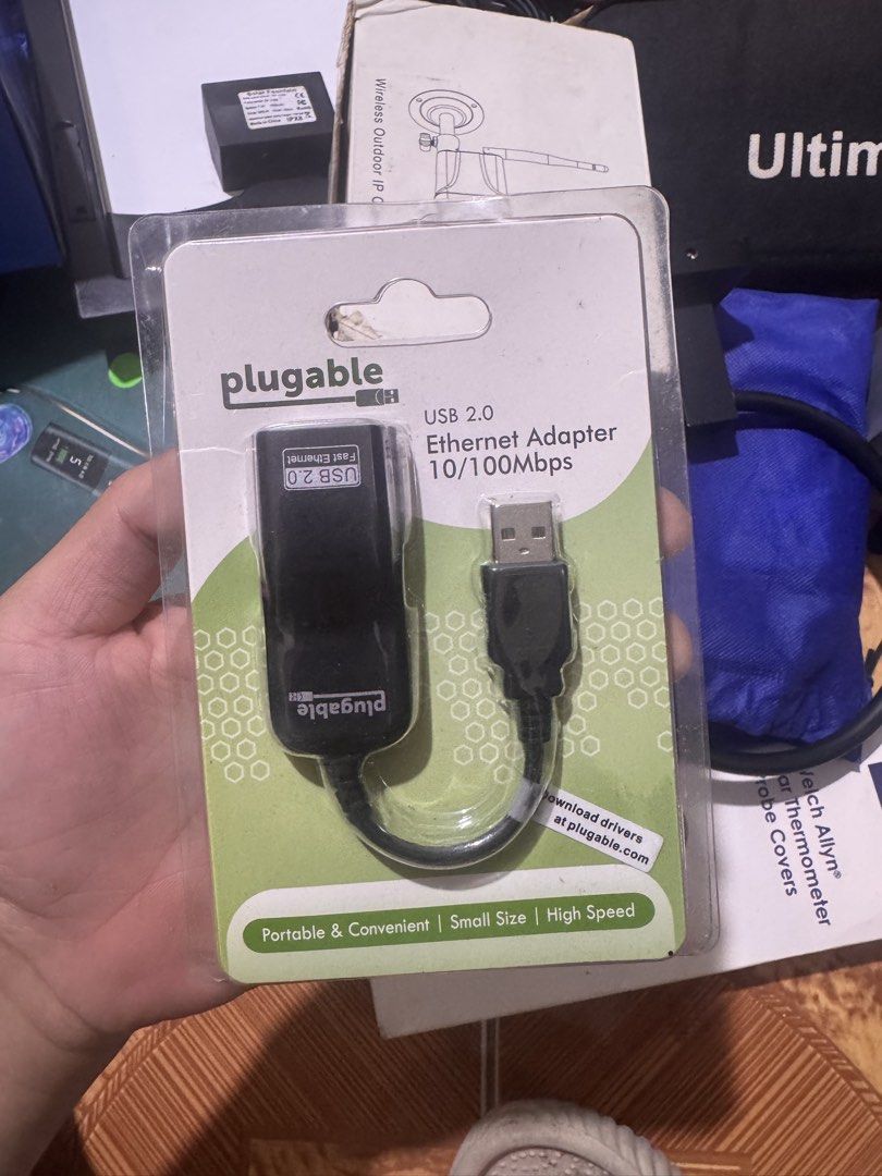 Plugable USB 2.0 to Ethernet Adapter (Category: Cables & Adaptors) located in Manila. Submitted by cheaponsales (Listing ID 1426462508, Image 1). Description: The Plugable USB 2.0 to 10/100 Network Adapter provides fast Ethernet connectivity via USB, features a compact external design, and is largely compatible thanks to the ASIX AX88772 chipset. Two LEDs monitor power and link activity. Support for this adapter is built into the Nintendo Wii and