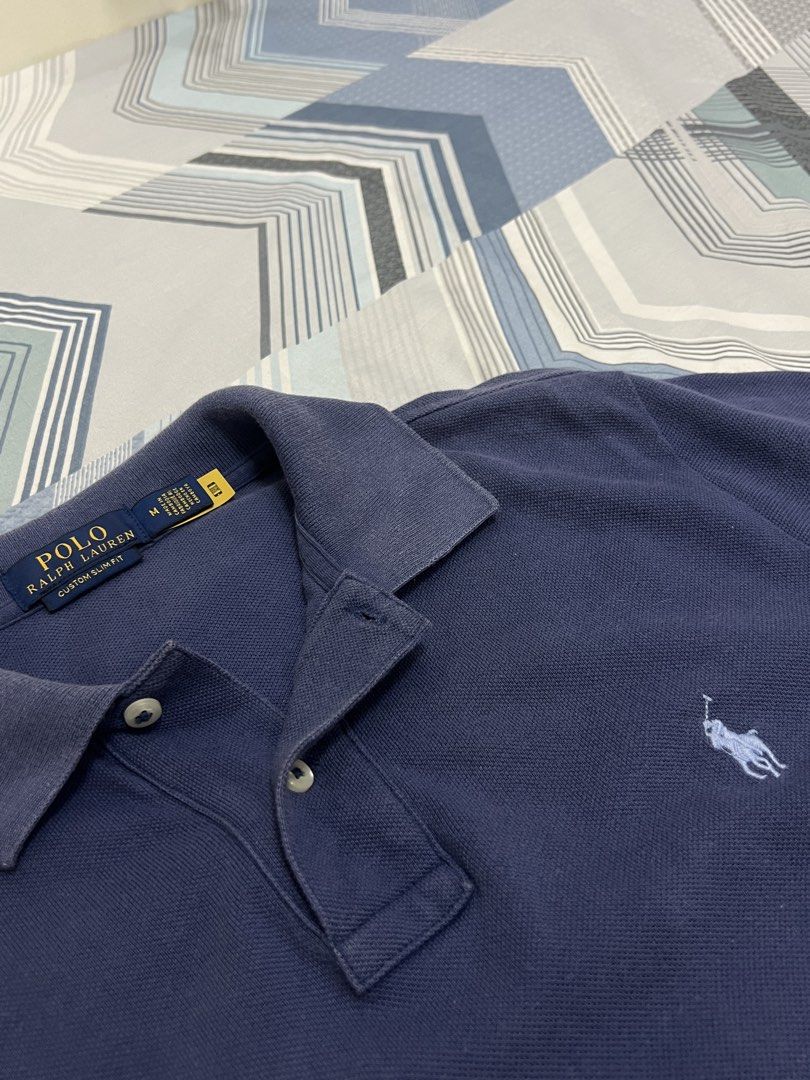Polo Ralph Lauren Polo Shirt (Authentic) (Category: Tshirts & Polo Shirts ) located in Manila. Submitted by rackarchives_ (Listing ID 1426438237, Image 2). Description: (Authentic) Ralph Lauren Blue Polo Shirt Length: 26 Width: 18 Issue: None Condition: Good.