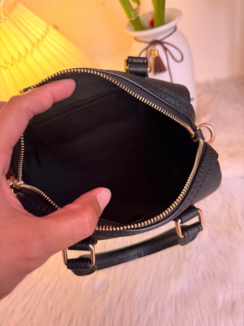 Rowan Coach Mini Cylinder Bag with Cherry Charm (Category: Luxury Bags & Wallets) located in Quezon City. Submitted by spikesforhope (Listing ID 1426552184, Image 2). Description: Rowan Coach 😍🖤🍒 made in vietnam ✔️ ykk zip/iteketa ✔️ Excellent condition ✔️ Dm for inquiries ❗️.