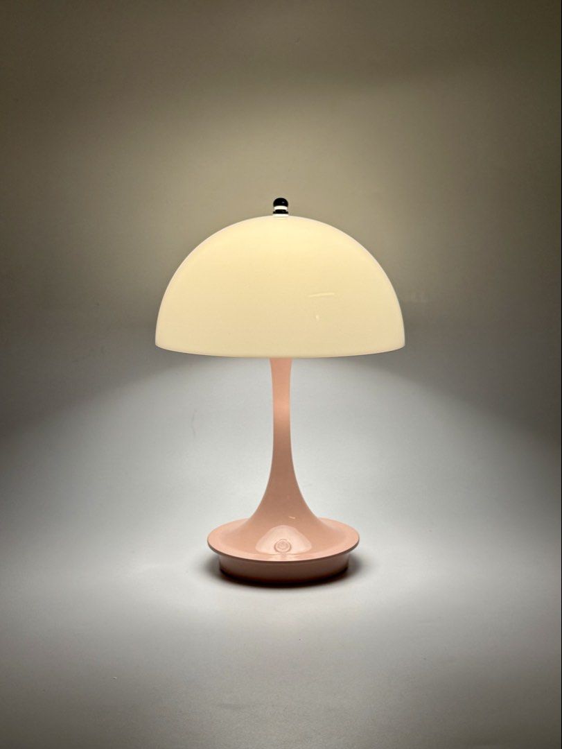 Sakura Pink Panthella Danish Scandinavian Rechargeable LED Lamp (Repro) (Category: Lighting) located in Manila. Submitted by staylit.ph (Listing ID 1426530566, Image 1). Description: Sakura Pink Panthella Danish Scandinavian Rechargeable LED Lamp (Repro) • PhP950 (Brand New with Box) • Dimensions: 9”H x 6.5”W • Features: Three Dimmable Light Modes (Warm, Cool, White), Translucent Shade providing soft diffused glow • Colors: White Head, Pink Stem 