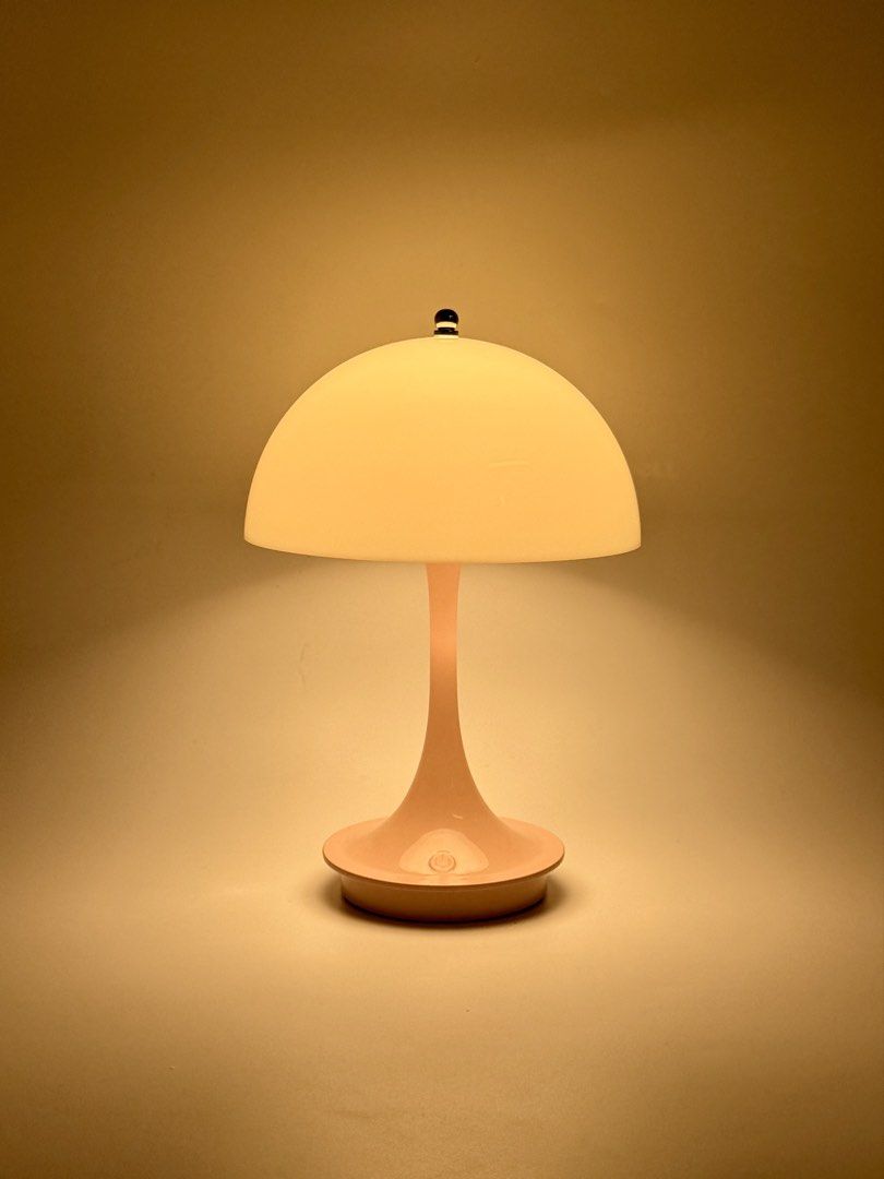 Sakura Pink Panthella Danish Scandinavian Rechargeable LED Lamp (Repro) (Category: Lighting) located in Manila. Submitted by staylit.ph (Listing ID 1426530566, Image 2). Description: Sakura Pink Panthella Danish Scandinavian Rechargeable LED Lamp (Repro) • PhP950 (Brand New with Box) • Dimensions: 9”H x 6.5”W • Features: Three Dimmable Light Modes (Warm, Cool, White), Translucent Shade providing soft diffused glow • Colors: White Head, Pink Stem 