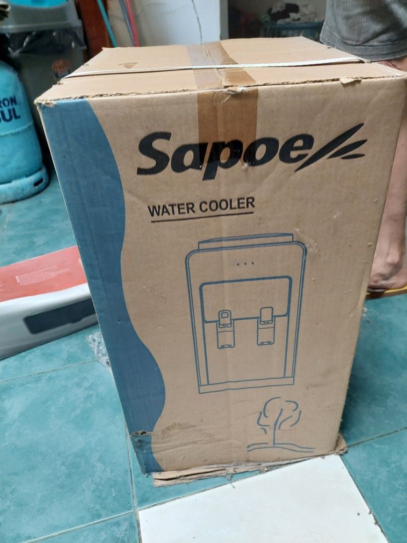 Sapoe Water Cooler C STTD-2270 (Category: Water Purifiers & Dispensers) located in Quezon City. Submitted by ayaacinth (Listing ID 1426466670, Image 3). Description: Sapoee water cooler, model STTD-2270. The box indicates the gross weight is 10.3 kgs and the net weight is 9.4 kgs. The dimensions are 290x360x510 mm. Made in China. Includes 1 piece. Distributed by Rite-Way Distributors, Inc..