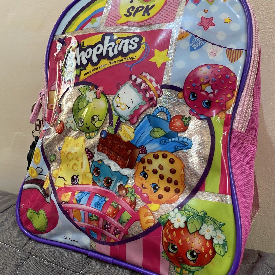 Shopkins Small Backpack (Category: Other Babies Going Out Needs) located in Imus. Submitted by shopfromlilo (Listing ID 1426508800, Image 2). Description: Well-used. Please manage expectations. Needs washing. With free Shopkins keychains. Imus Cavite location. Lalamove or J&T. #shopkins #shopkinsbag #kidsbag #kidsbackpack.