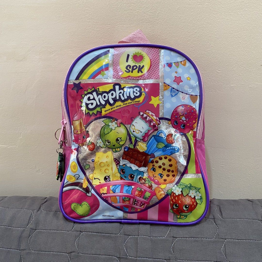 Shopkins Small Backpack (Category: Other Babies Going Out Needs) located in Imus. Submitted by shopfromlilo (Listing ID 1426508800, Image 1). Description: Well-used. Please manage expectations. Needs washing. With free Shopkins keychains. Imus Cavite location. Lalamove or J&T. #shopkins #shopkinsbag #kidsbag #kidsbackpack.