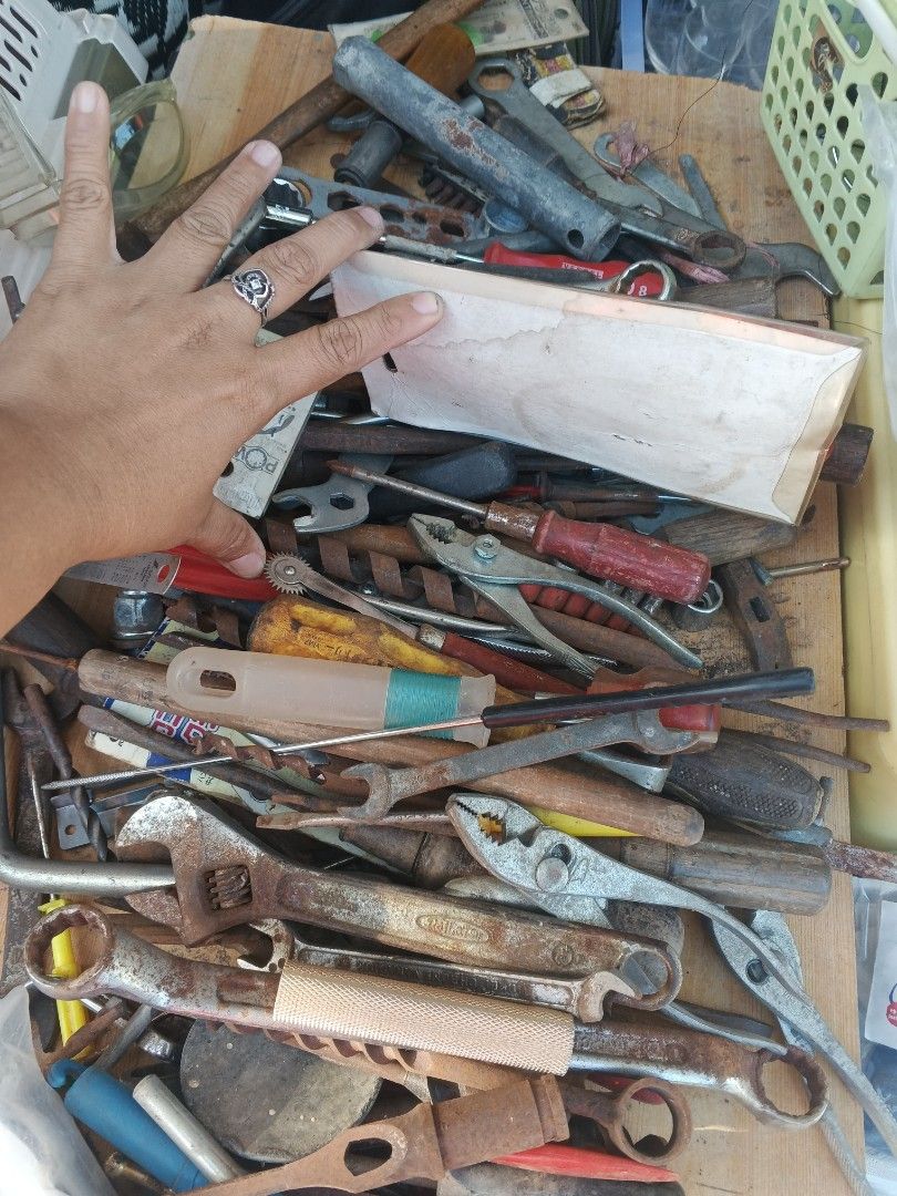 Take all Assorted Hand Tools (Category: Construction Tools & Equipment) located in Caloocan City. Submitted by surplusandbnewshop (Listing ID 1426474051, Image 3). Description: Collection of various hand tools including wrenches, screwdrivers, pliers, and sockets. Includes tools of different sizes and types. Some tools appear to have wooden handles. Ideal for various repair and maintenance tasks. A comprehensive set for both DIY enthusiasts and p