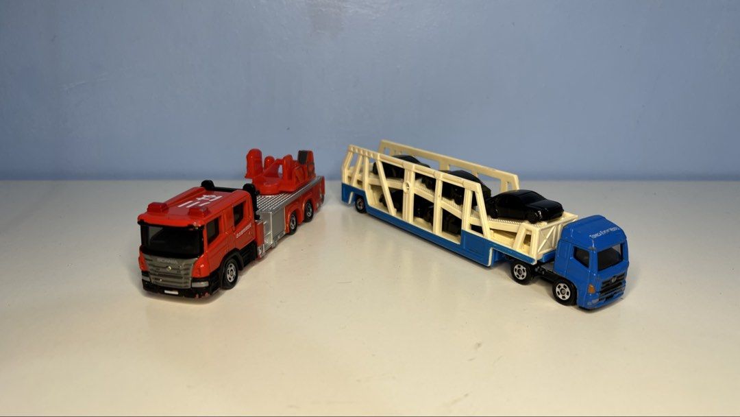 Tomica Fire Truck and Transporter (Category: Vehicle & Diecast Models) located in Bacoor. Submitted by momofkas1 (Listing ID 1426398619, Image 1). Description: .