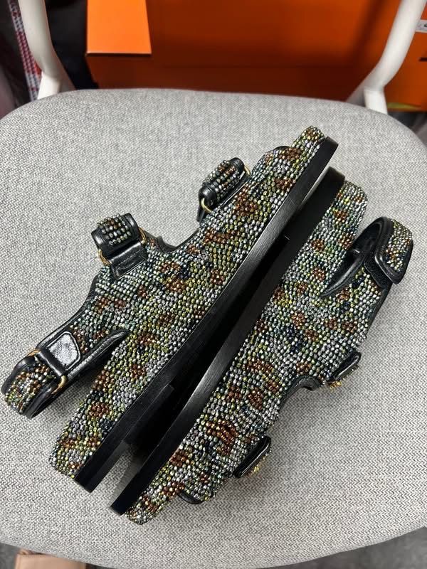 Unused Chanel Embellished Sandals (Category: Sneakers & Footwear) located in Quezon City. Submitted by hellopatchi (Listing ID 1426471879, Image 2). Description: With dust bag included Authentic Chanel sandals featuring a multi-colored embellished design. These sandals have adjustable straps and the iconic Chanel logo on the insole and the straps. The soles are black. The sandals have gold-tone hardware..