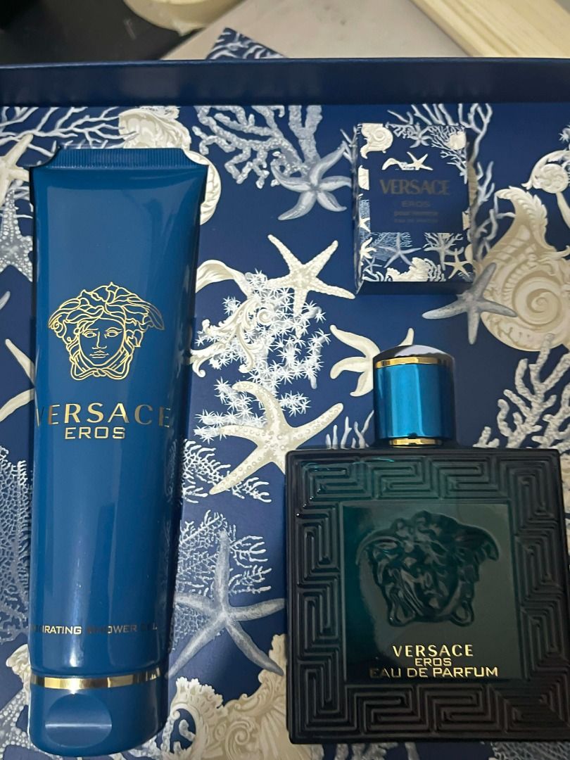 Versace Eros Eau de Parfum Set 100ml + 5ml + shower gel (Category: Fragrance & Deodorants) located in Caloocan City. Submitted by jepascual (Listing ID 1426385341, Image 1). Description: Versace Eros set includes an Eau de Parfum, a hydrating shower gel, and a soap. The fragrance bottle is dark green with a blue cap. The set comes in a blue box with a sea-themed design. The shower gel and soap are also branded with the Versace Eros logo..