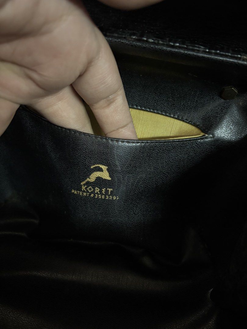 Vintage Koret Black Woven Handbag (Category: Tote Bags) located in Rizal. Submitted by heyninya (Listing ID 1426480869, Image 3). Description: - Koret black handbag - Woven design with glossy black finish - Gold-toned clasp and handle accents - Yellow interior lining - Features a small interior pocket - Authentic Koret bag Have sign of used na.hardware fadings but super good condition. 💖.