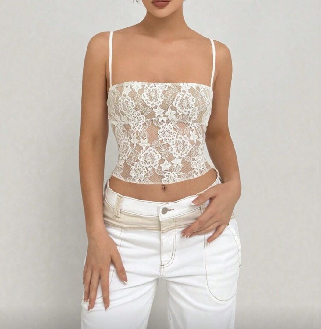 White Lace Top (Category: Sleeveless) located in Quezon City. Submitted by dcltyef (Listing ID 1426483308, Image 2). Description: Never been worn.