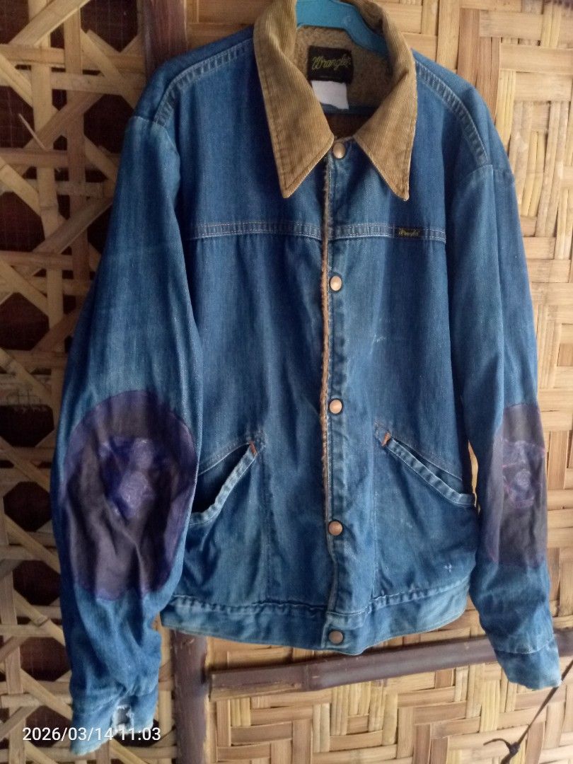 Wrangler Denim Jacket with Corduroy Collar (Category: Coats, Jackets and Outerwear) located in Trinidad. Submitted by i-thifthing-shop (Listing ID 1426410951, Image 1). Description: Vintage Wrangler denim jacket. Features a corduroy collar and button closure. Includes two front pockets and patches on the elbows. The jacket has a Wrangler logo on the chest. Made in the U.S.A..
