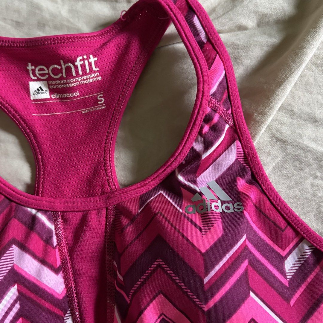 Adidas Sportsbra (Category: Activewear) located in Tarlac. Submitted by 3fted (Listing ID 1426641575, Image 2). Description: adidas small on tag size in inches (laid flat measurement) -- bust: 12 in -- band: 10 in with pad slot & pads 10/ 10 condition -- very good condi! Color Rate: 10/10 Cloth Rate: 10/10.