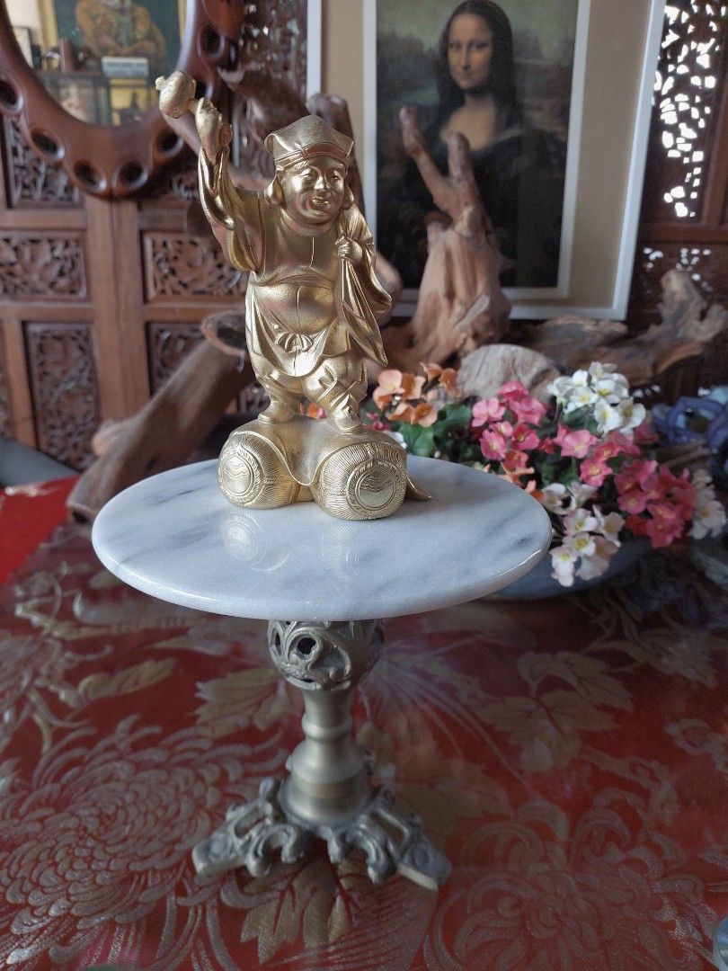 Antique Marble Top Mini Table 19th - century (Category: Tables & Sets) located in Bulacan. Submitted by hnbfinds (Listing ID 1426659445, Image 2). Description: This item is a vintage, possibly 19th-century, ornate pedestal table featuring a white marble top with gray veining and a carved brass or bronze base. Style: Often categorized as Gothic-influenced or Hollywood Regency, designed to hold plants, lamps, or small decorative items. Dimensions: 