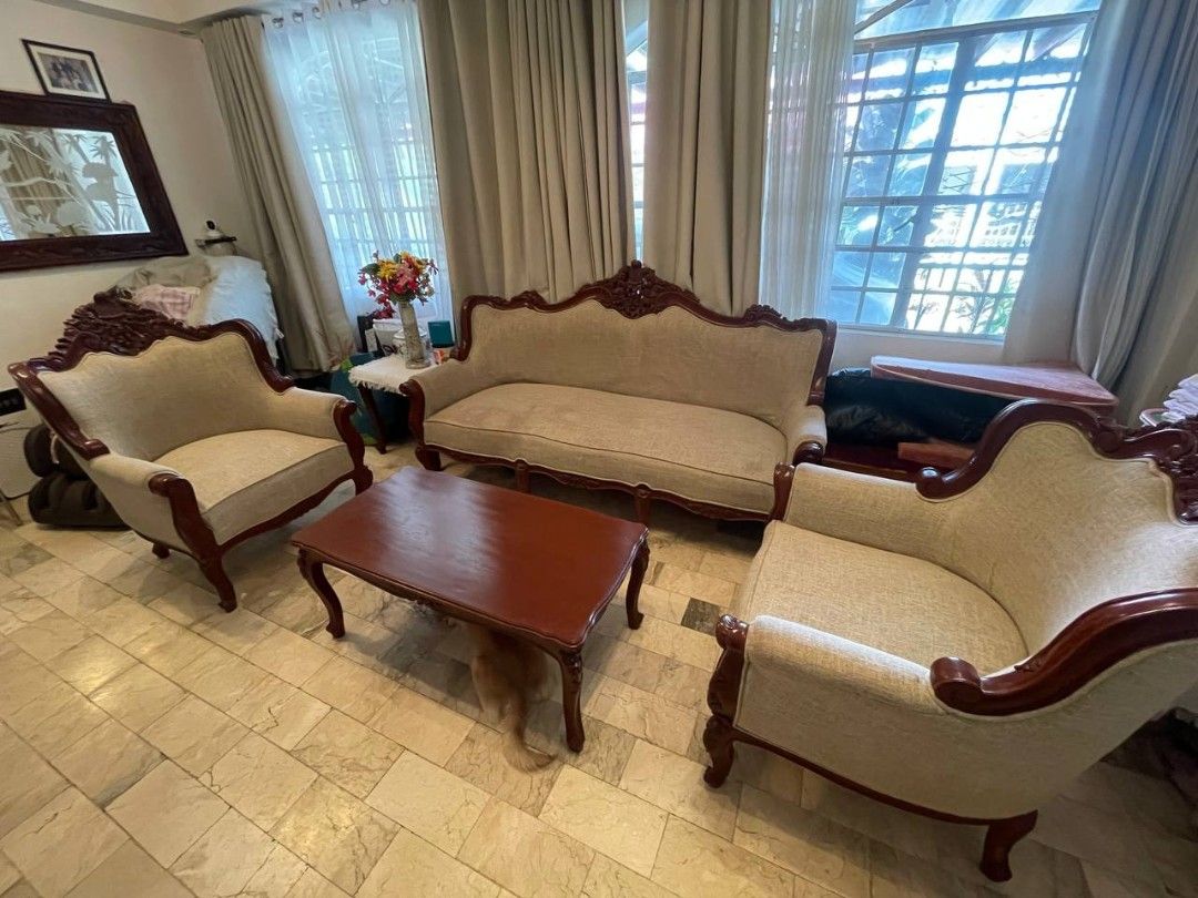 Antique Narra Sofa Set with Coffee Table and Side Table (×2) (Category: Sofas) located in Paranaque City. Submitted by bluegreen689 (Listing ID 1426600630, Image 1). Description: Selling Narra Sala Set (Living Room Set) Vintage Traditional Pure Narra with Fabric upholstery Center Table 2 Side Table (1 is not in the picture) 1 long couch 2 sofas Condition: Good. 8/10. Please see photos. I can provide more photos upon request if you're a sure buyer