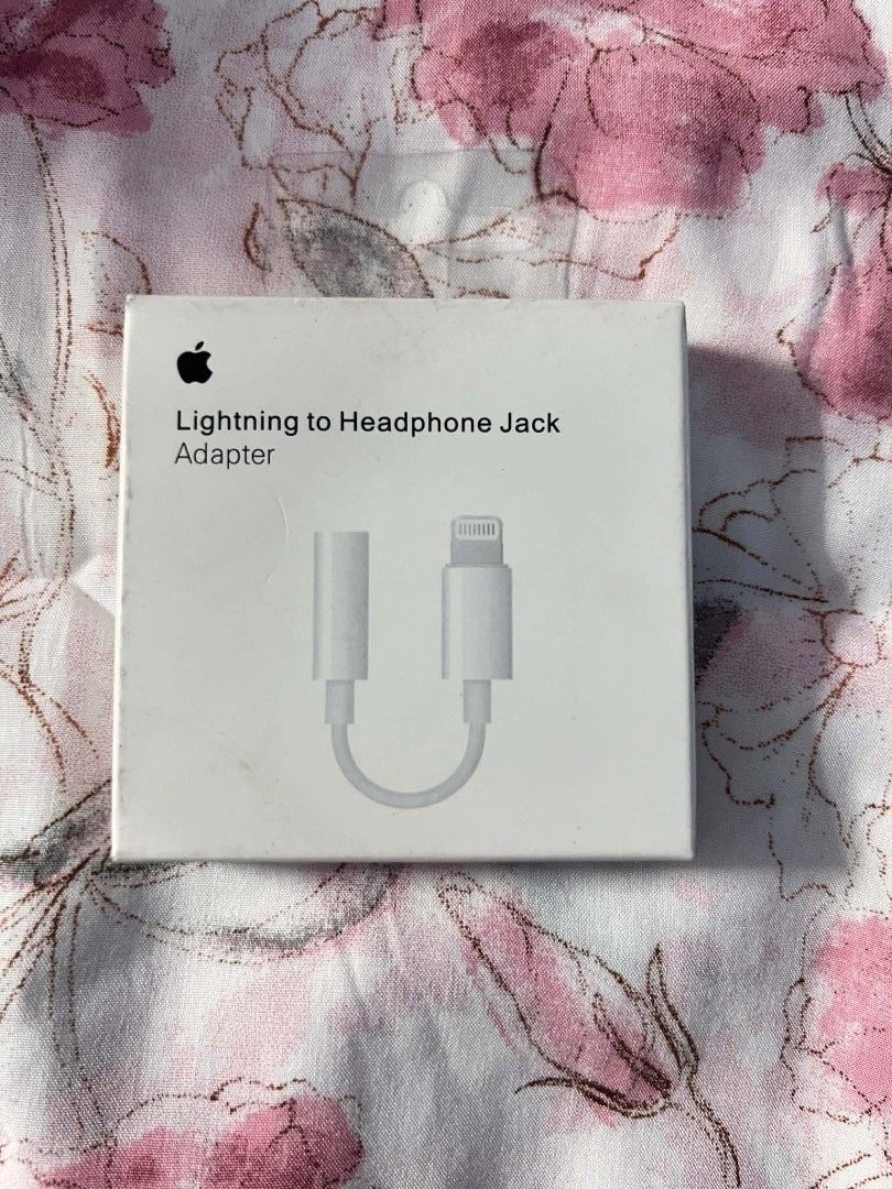 Apple Lightning to 3.5mm Headphone Jack Adapter (Category: Chargers & Cables) located in Manila. Submitted by onlineshopping22 (Listing ID 1426595494, Image 1). Description: - Connect your 3.5mm headphones to iPhone devices with a Lightning port. - Lightweight, durable, and delivers clear audio for music, calls, and everyday use. - Adapter with original box..