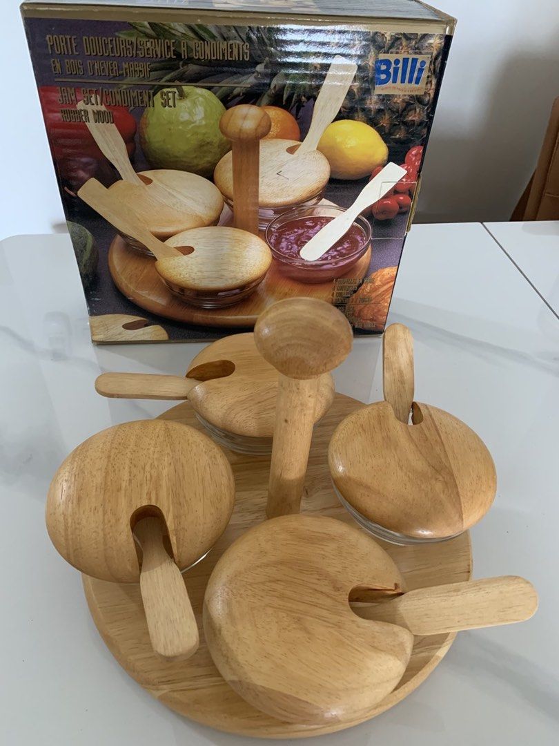Billi wooden jam/condiment serving set (Category: Dinnerware & Cutlery) located in Pasig City. Submitted by gedi_c (Listing ID 1426673420, Image 3). Description: Brand new Billi wooden condiment / jam serving set. Includes rotating wooden tray, 4 glass bowls with wooden lids and spoons. Perfect for jams, honey, sauces, or breakfast spreads. Great for entertaining or table display. Condition: Brand new with box..