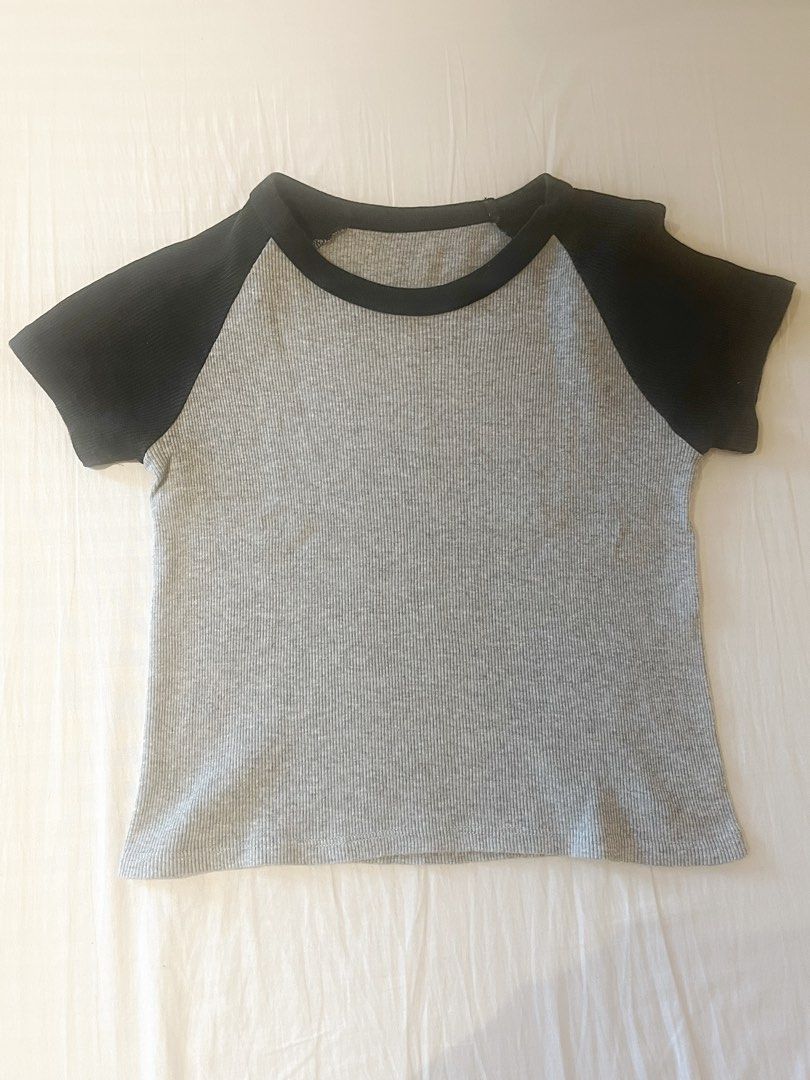 Brandy Melville Grey and Black Baseball Tee (Category: Shirts) located in Manila. Submitted by cammys.bin (Listing ID 1426696029, Image 2). Description: Bought a few years back from Brandy in San Francisco, but since I don’t wear it as much, I have decided to sell it🤍 Shipping paid by buyer.