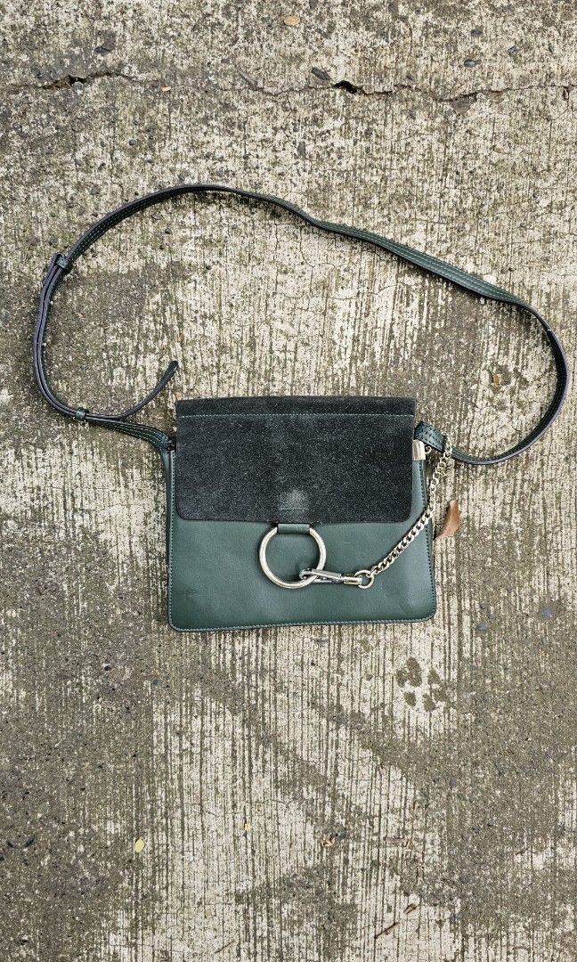 Chloe Faye Bag (Category: Luxury Bags & Wallets) located in Kibawe. Submitted by Thrift_ni_Babac (Listing ID 1426683925, Image 1). Description: For Sale Chloé Faye in a stunning forest green. This piece perfectly balances bohemian spirit with refined elegance, featuring the signature hoop and chain hardware that instantly identifies it as a classic. ​Product Details: ​Material: Smooth calfskin leather body with a plush suede top flap. ​Hardware: 