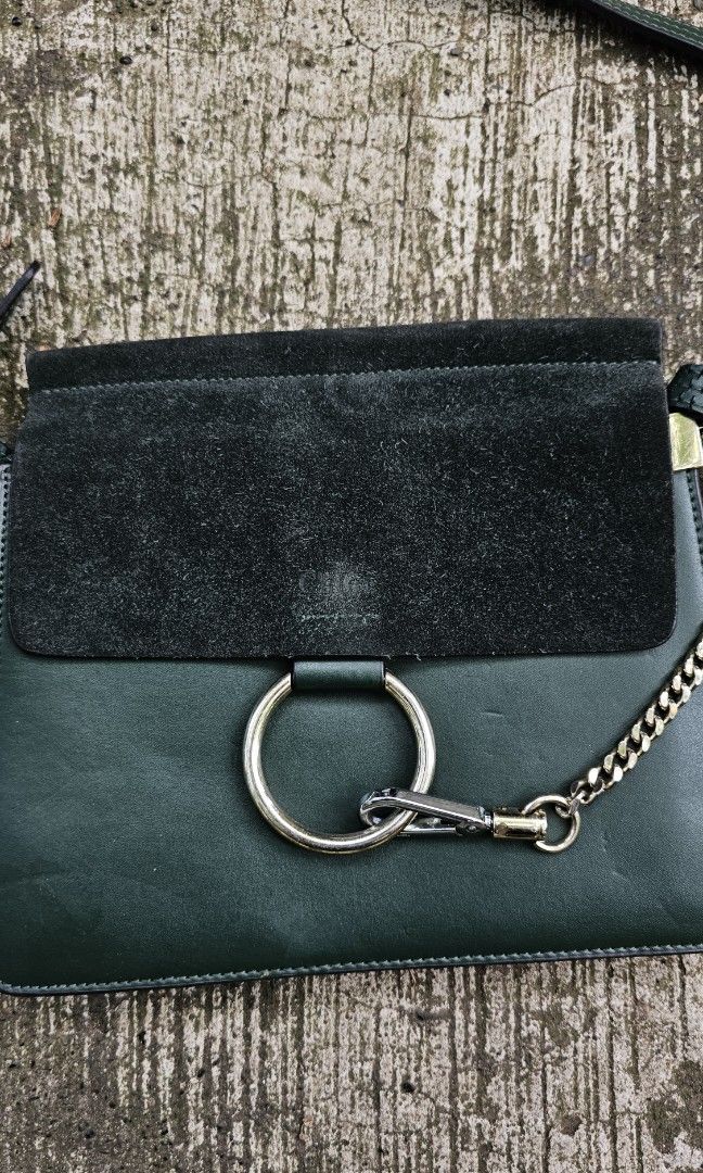 Chloe Faye Bag (Category: Luxury Bags & Wallets) located in Kibawe. Submitted by Thrift_ni_Babac (Listing ID 1426683925, Image 2). Description: For Sale Chloé Faye in a stunning forest green. This piece perfectly balances bohemian spirit with refined elegance, featuring the signature hoop and chain hardware that instantly identifies it as a classic. ​Product Details: ​Material: Smooth calfskin leather body with a plush suede top flap. ​Hardware: 