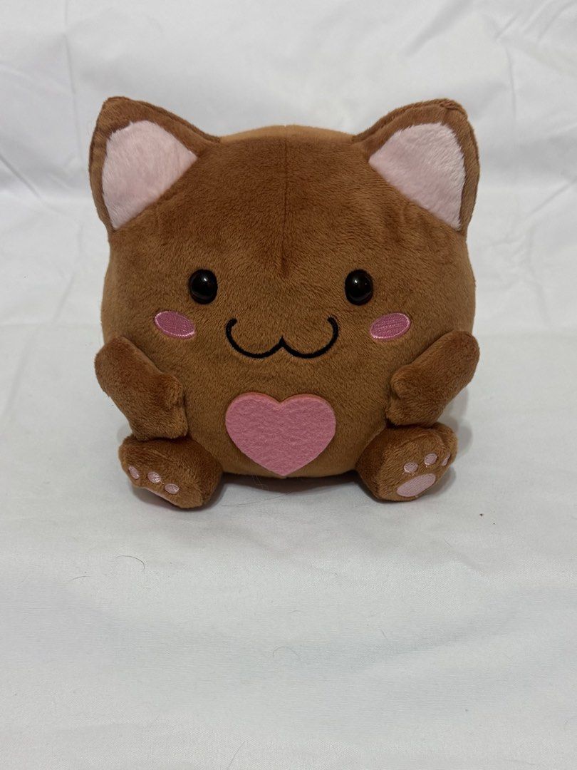 Choco Nyan Plushie (Category: Plushies & Soft Toys) located in Antipolo. Submitted by bhabiegraciefashionlab (Listing ID 1426591048, Image 1). Description: - Adorable Choco Nyan Plushie - Features a cute brown cat design with a heart - Soft and huggable material - Suitable for ages 3 and up - Meetup locations available in Antipolo.