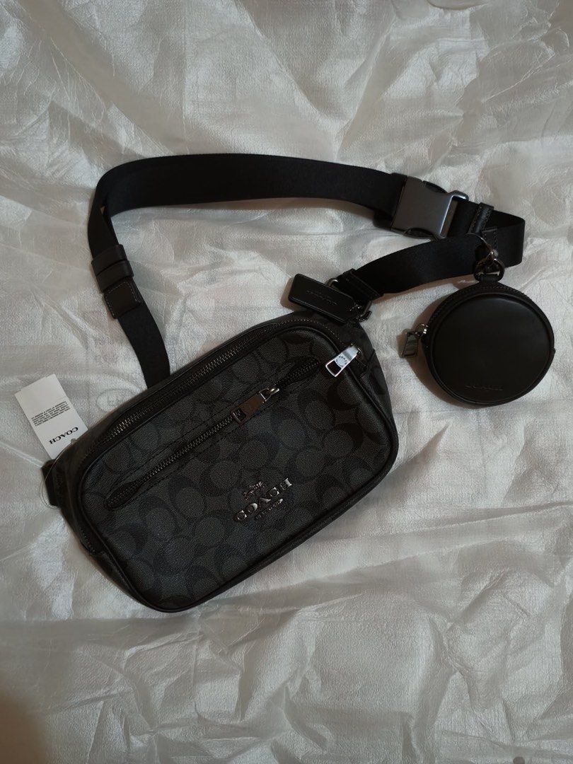 Coach Elias Belt Bag Sig (Category: Belt bags, Clutches and Pouches) located in Muntinlupa City. Submitted by gepdeg (Listing ID 1426671503, Image 1). Description: Coach Elias belt bag features a signature pattern and includes a detachable coin purse. The bag has a zip closure and an adjustable strap with a buckle. The bag has a tag with the model number CJ506 and the color is QB/Charcoal. The comparable value is $350 USD and $430 CAD..