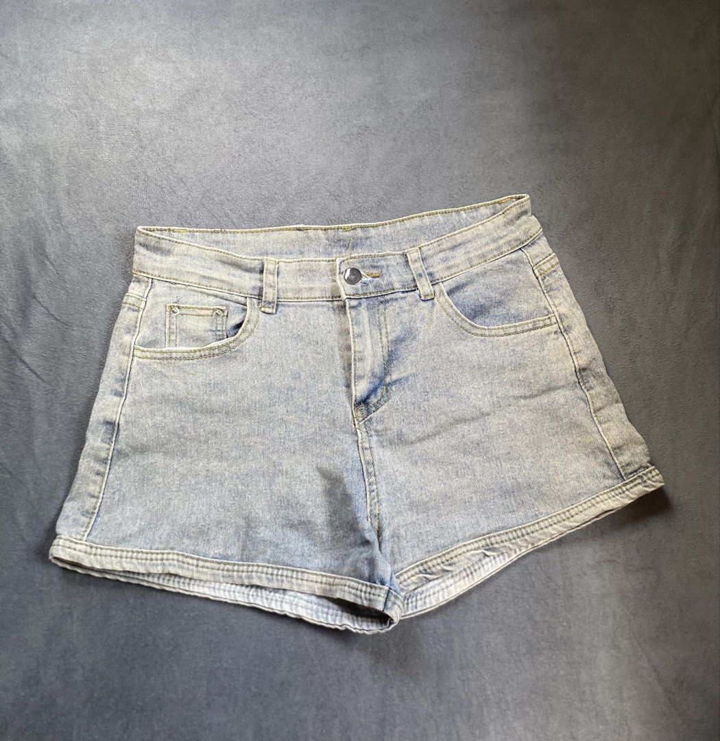 Denim Shorts with Zipper Pockets Size 30 (Category: Shorts) located in Mamburao. Submitted by marieac (Listing ID 1426647069, Image 1). Description: Light blue denim shorts. Features a classic five-pocket design with two front pockets and two back pockets with zippers. The shorts have a button and zipper closure. The shorts have a standard fit..