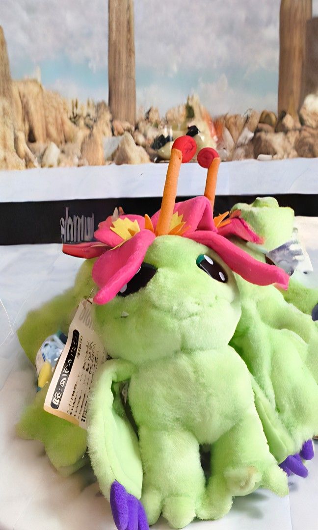 Digimon Palmon Bandai 1999 (Category: Plushies & Soft Toys) located in Virac. Submitted by gegosar (Listing ID 1426619890, Image 1). Description: - Only 1 is for sale - Vintage Bandai 1999, 7" Version - With papertag - Free sf - Product Identification: The item is a vintage plush toy of the character Palmon from the popular anime series Digimon Adventure. - Manufacturer and Release Year: It was manufactured by Bandai and originally released aroun