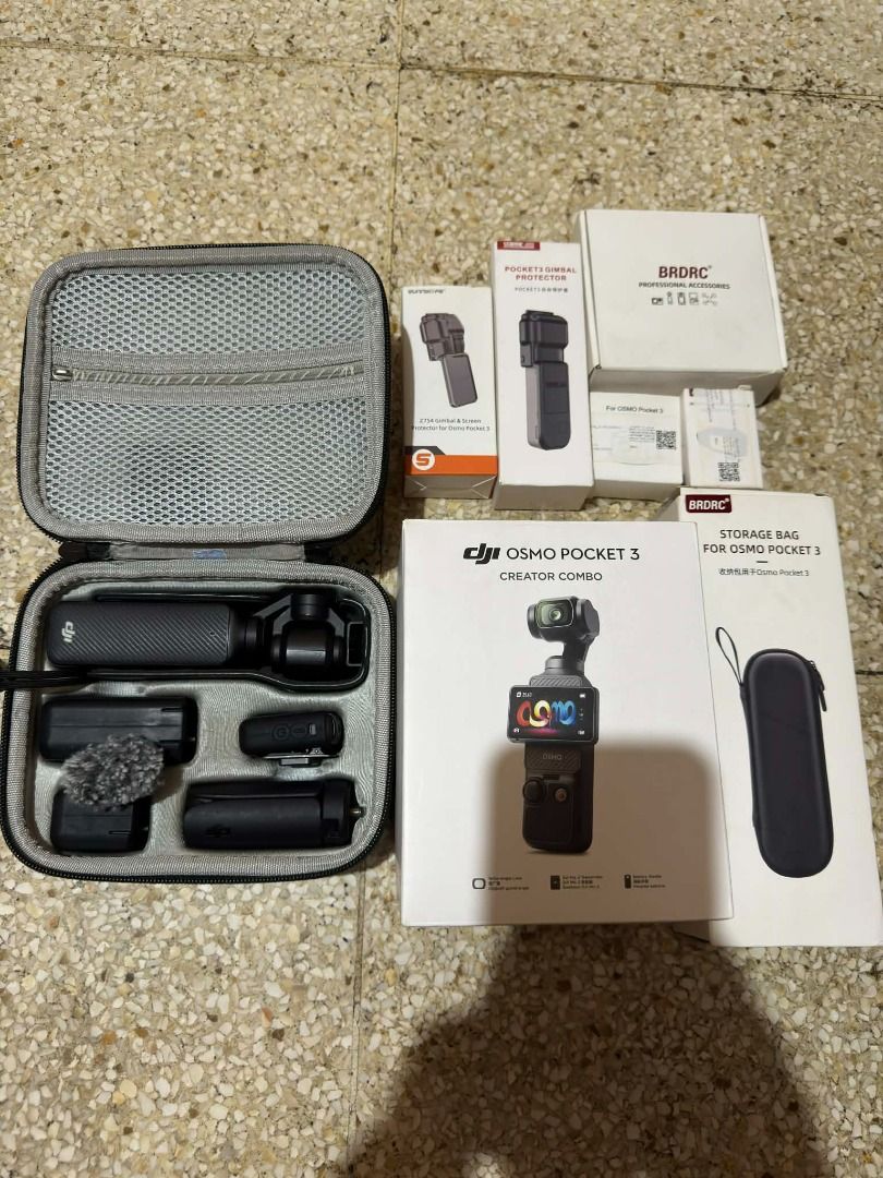 DJI Osmo Pocket 3 Creator Combo (With third party accessories) (Category: Cameras) located in Quezon City. Submitted by mhirone (Listing ID 1426764706, Image 1). Description: DJI OSMO POCKET 3 CREATOR COMBO • No issue and dents • With receipt and DJI eco bag Location: Metro Manila, can do meet up around Quezon City Complete Set Inclusions: • DJI Osmo Pocket 3 Unit • DJI Mic 2 Transmitter + Windscreen • Battery Handle & Mini Tripod • Wide-Angle Le