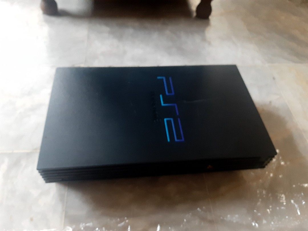 Retro game console Family Computer & Ps 2 console (Category: Others) located in Paranaque City. Submitted by hypnos924 (Listing ID 1426709098, Image 3). Description: • Family Computer Console and games. • PS 2 Console only (with damaged disk tray.) No additional accessories. Take all bundle. If not marked as sold, yes it's still available. Sm Bicutan only for meetups. If you prefer to ship, payment for the item is through gcash or paymaya. (My ac