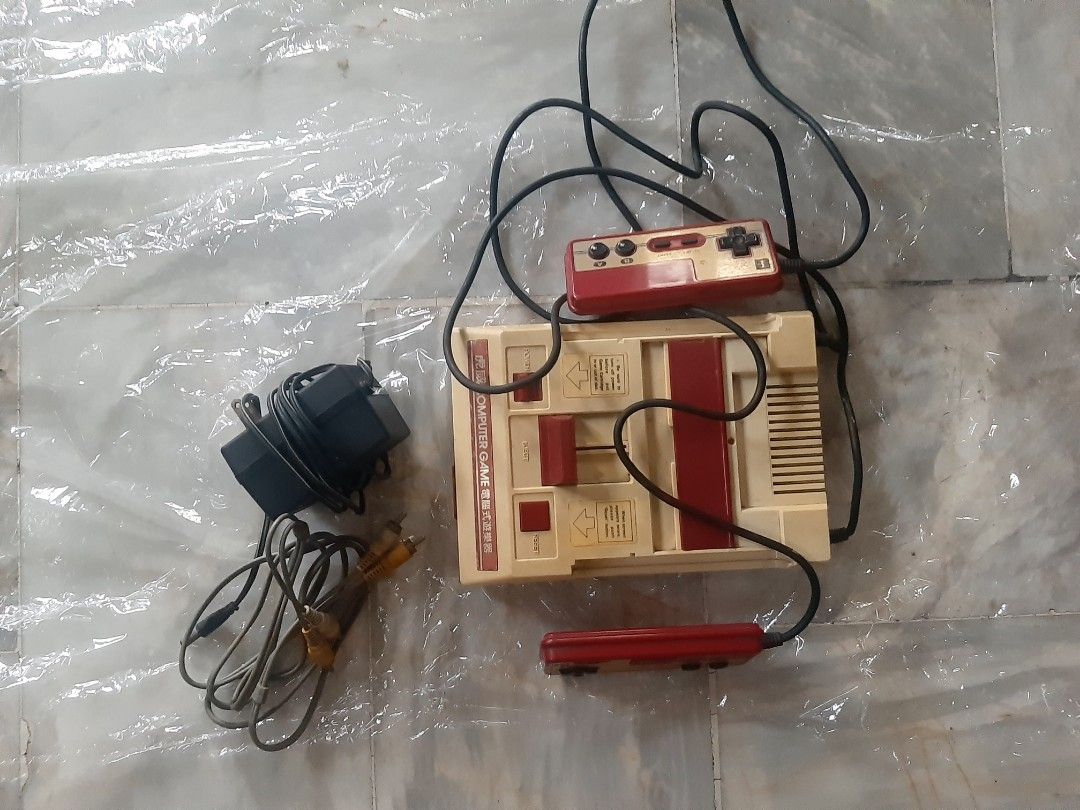 Retro game console Family Computer & Ps 2 console (Category: Others) located in Paranaque City. Submitted by hypnos924 (Listing ID 1426709098, Image 1). Description: • Family Computer Console and games. • PS 2 Console only (with damaged disk tray.) No additional accessories. Take all bundle. If not marked as sold, yes it's still available. Sm Bicutan only for meetups. If you prefer to ship, payment for the item is through gcash or paymaya. (My ac