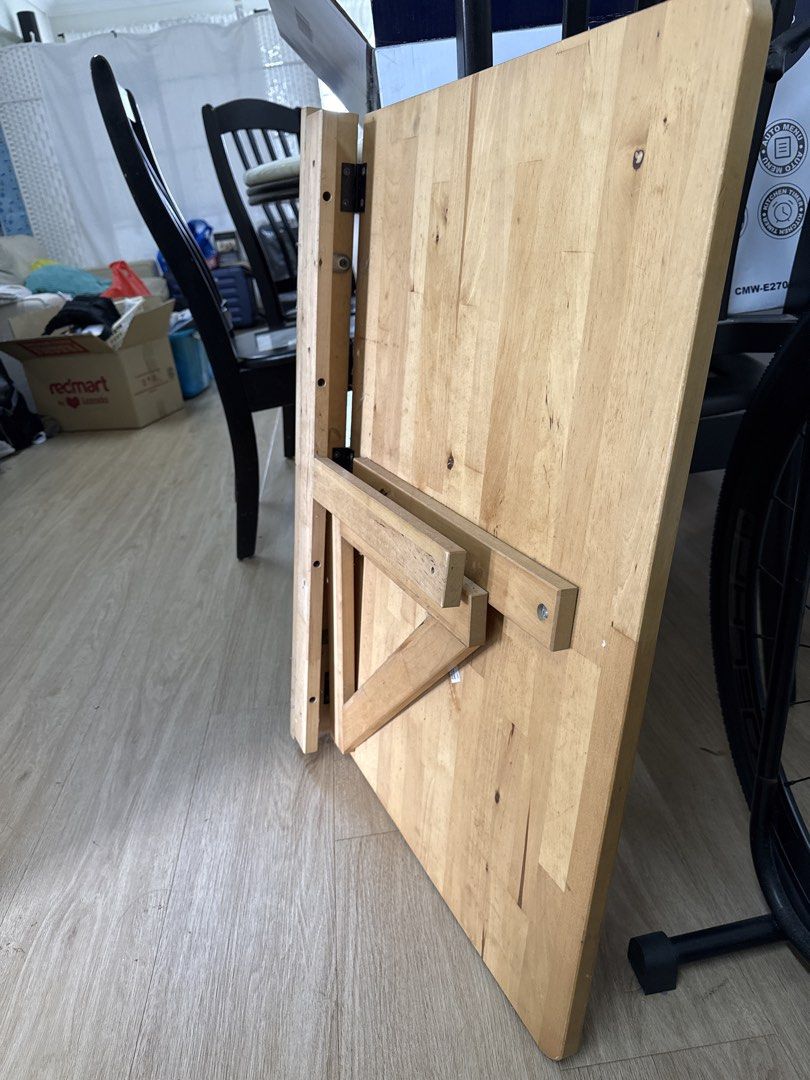 Foldable Side Table (Category: Tables & Sets) located in Singapore. Submitted by mikesembawang (Listing ID 1426610768, Image 1). Description: Dimensions: 79 \text{ cm} \times 59 \text{ cm} (roughly 31” x 23”). • Folded Depth: It sits only about 8 cm (3”) off the wall when tucked away. • Material: Solid birch finished with a clear acrylic lacquer..