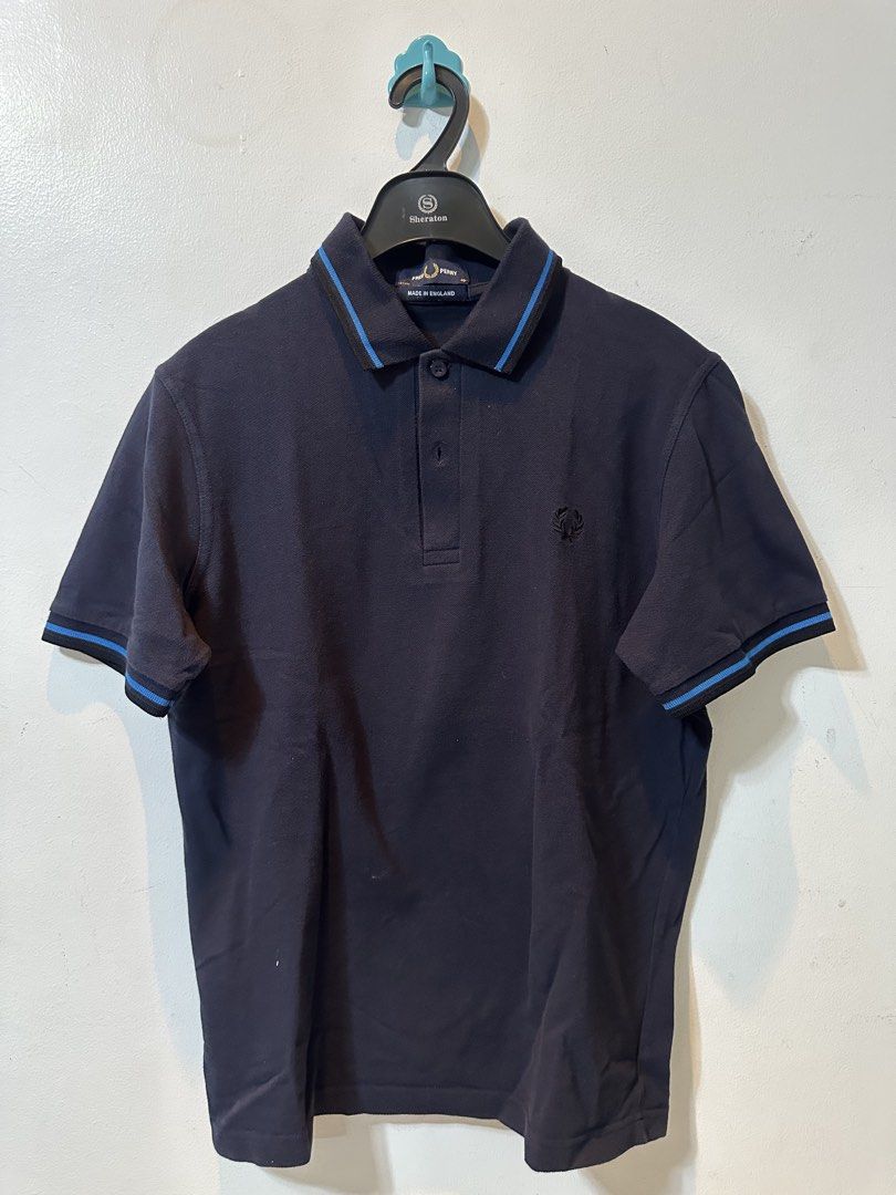 Fred Perry Navy Blue Polo Shirt (Category: Tshirts & Polo Shirts ) located in Santa Rosa. Submitted by dfinds (Listing ID 1426769833, Image 1). Description: .