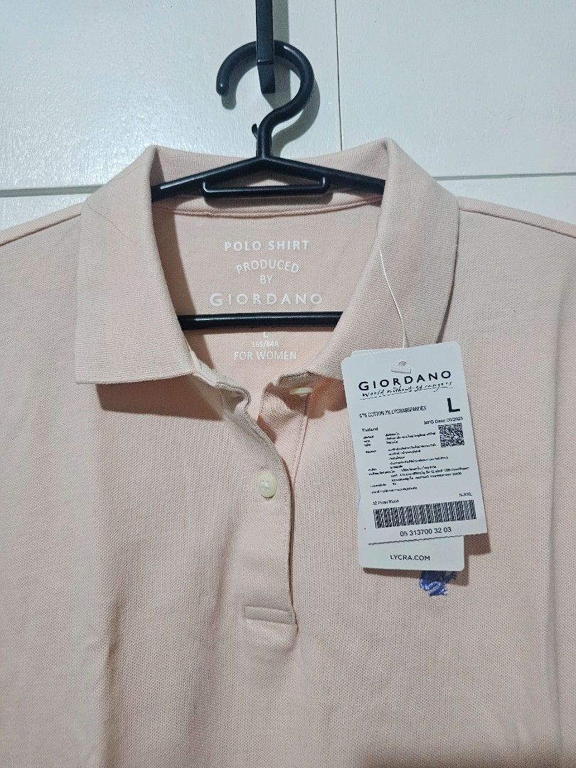 Giordano Polo Shirt - Size L (Category: Shirts) located in Balanga. Submitted by clearchaos (Listing ID 1426660937, Image 1). Description: Giordano polo shirt in a pearl blush color. Features a classic polo collar and short sleeves with blue trim. Includes the original tag. Size L..