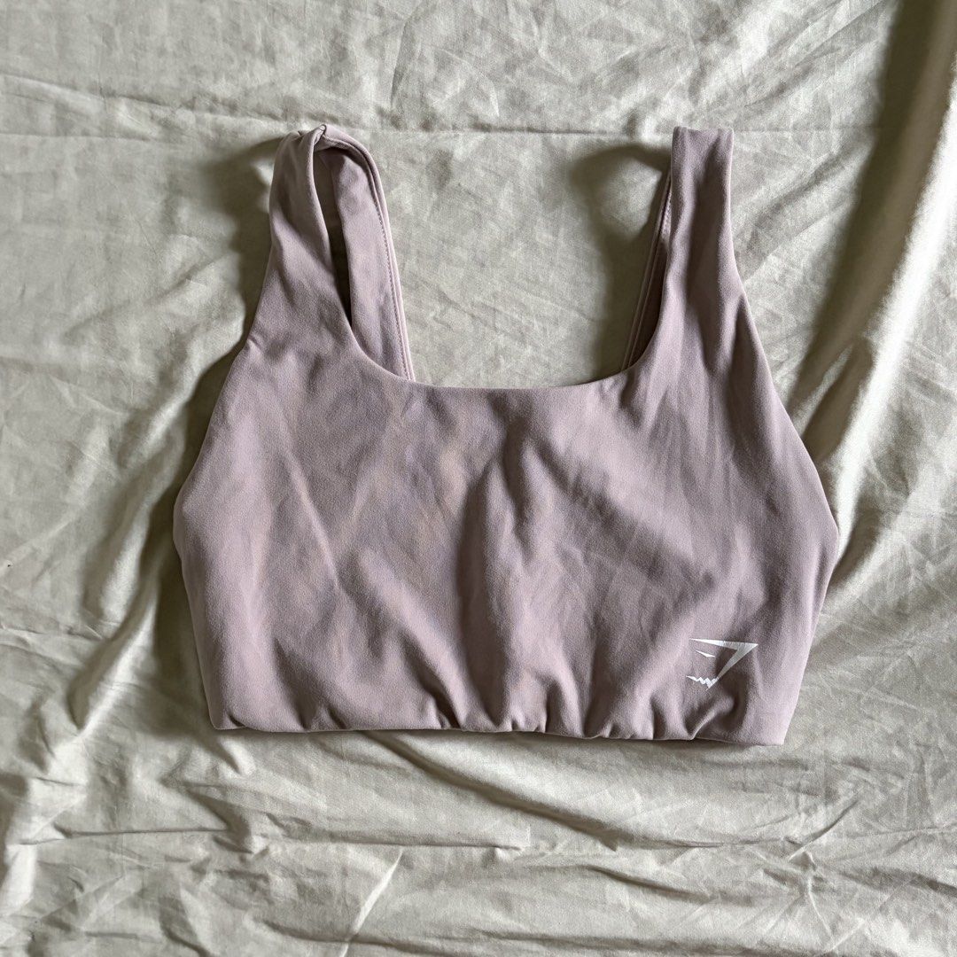 Gymshark Sportsbra (Category: Activewear) located in Tarlac. Submitted by 3fted (Listing ID 1426644483, Image 1). Description: gymshark small on tag size in inches (laid flat measurement) -- bust: 13 in -- band: 11 in no pads but with pad slot 9.5/ 10 condition -- ganda ng color, very aesthetic! 😍 only issue: hairline crack print Color Rate: 10/10 Cloth Rate: 10/10.