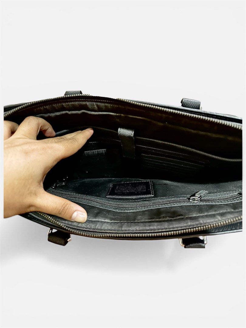 Harrison Leather Briefcase | Michael Kors (Category: Luxury Bags & Wallets) located in Paranaque City. Submitted by jdval28 (Listing ID 1426744563, Image 2). Description: Original Bought it from Paris for 40,000.00 Php Negotiable Inside lining needs some washing due to storage 100% Leather • Gunmetal Hardware • 16”W X 11.5”H X 2.5”D • Handle Drop: 4.5” • Adjustable Strap: 21”-27” • Exterior Details: Back Slip Pocket • Interior Details: Tablet Sle